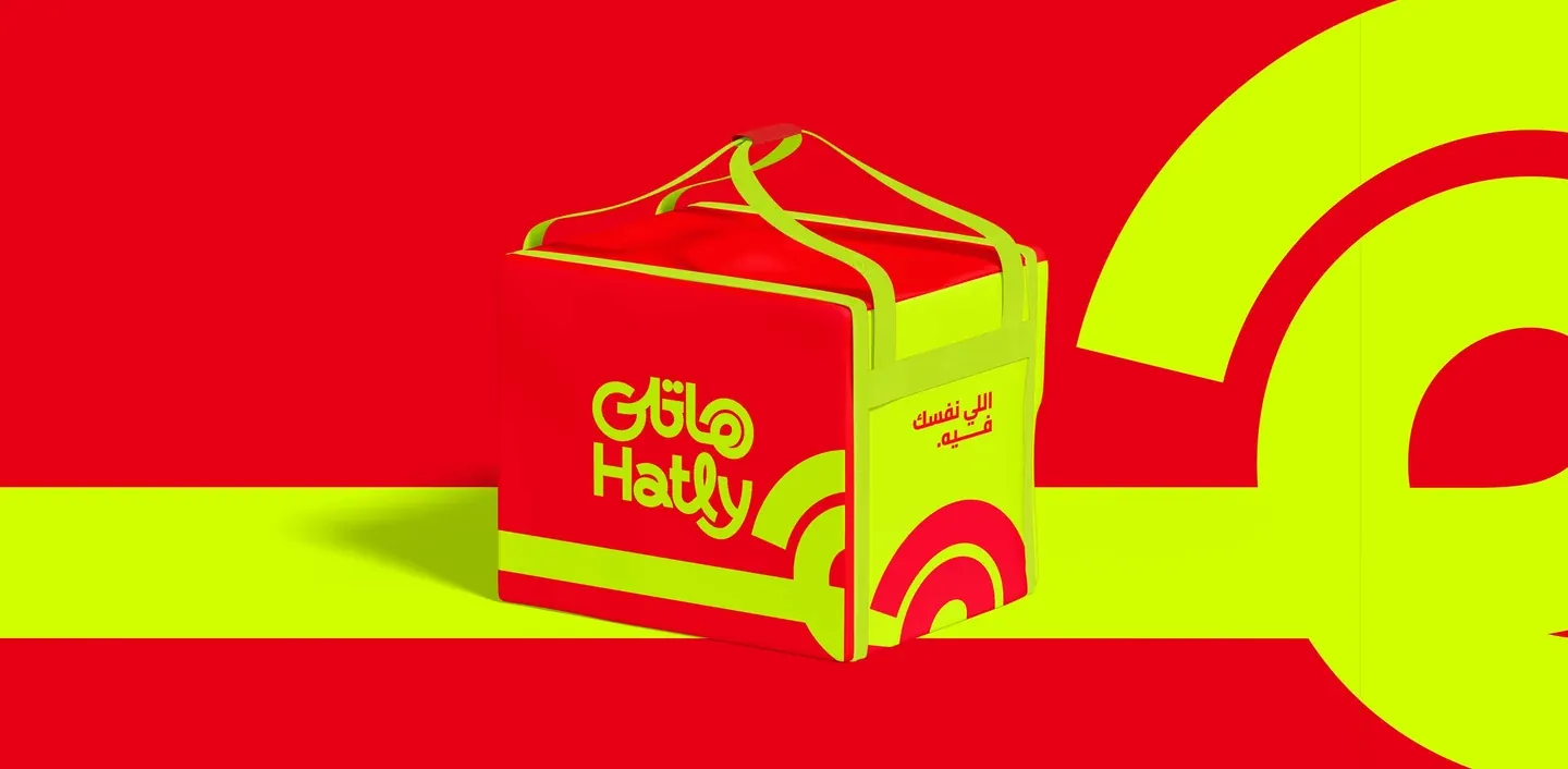 Hatly insulated delivery bag on a red and lime branded background