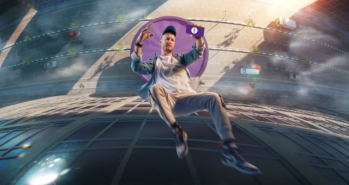 WE campaign scene with a man suspended in a purple chair above a city