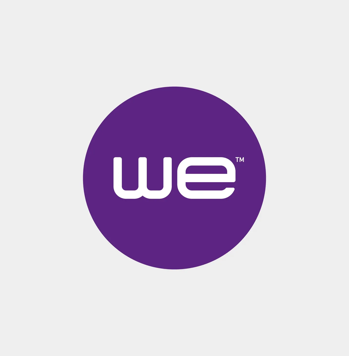 WE white English logo inside a purple circle on a light background