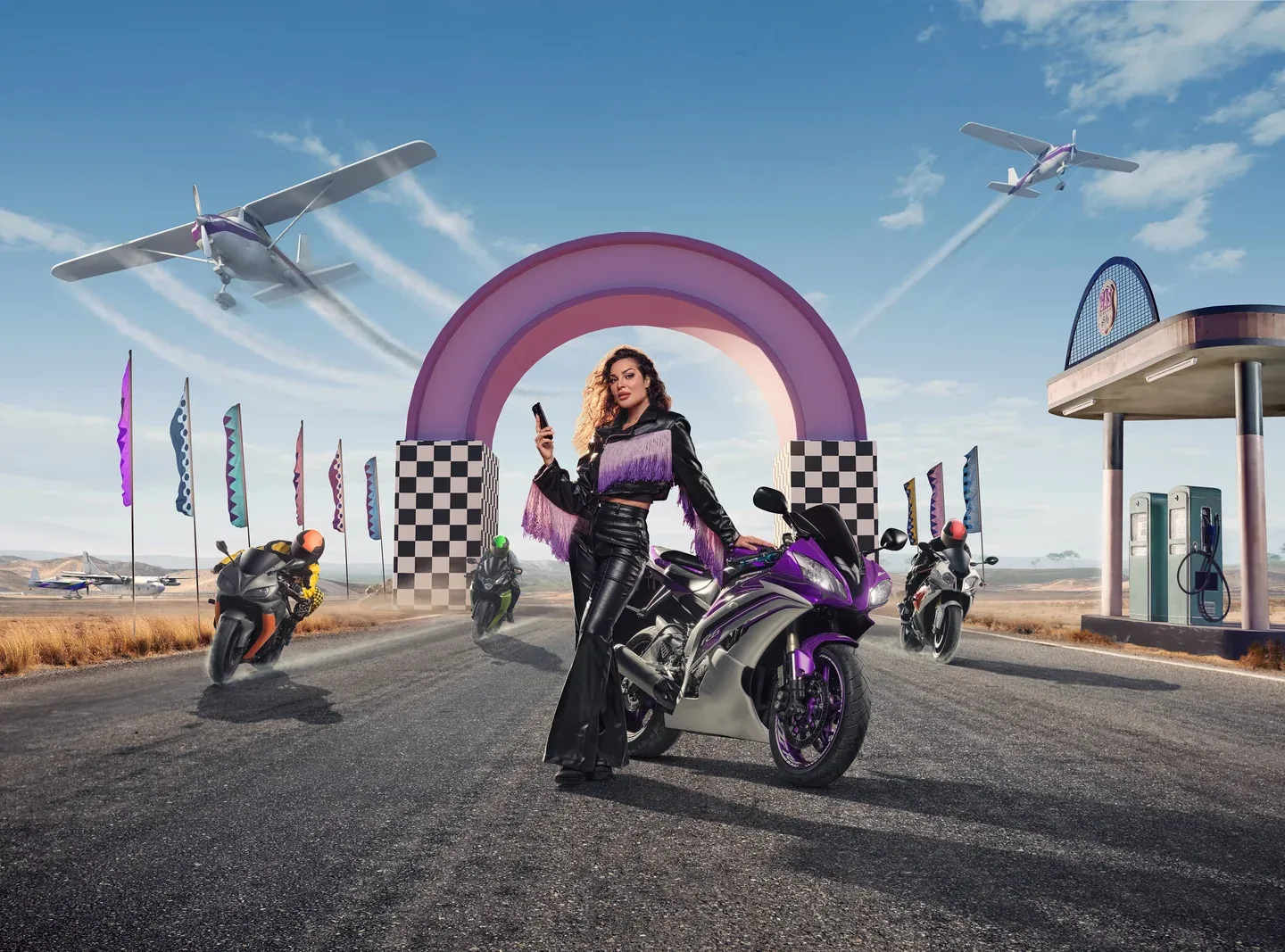 WE campaign scene with a woman and motorcycle beside a purple arch, racing flags and aircraft