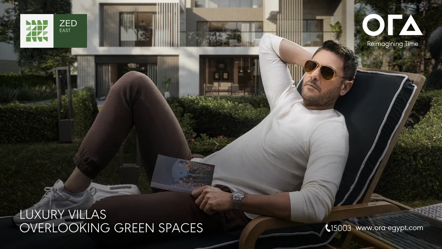 ZED East artwork with a man in an armchair beside a pool