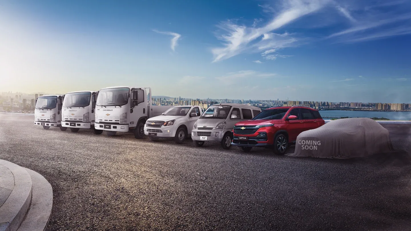 Chevrolet vehicles lined up in a landscape